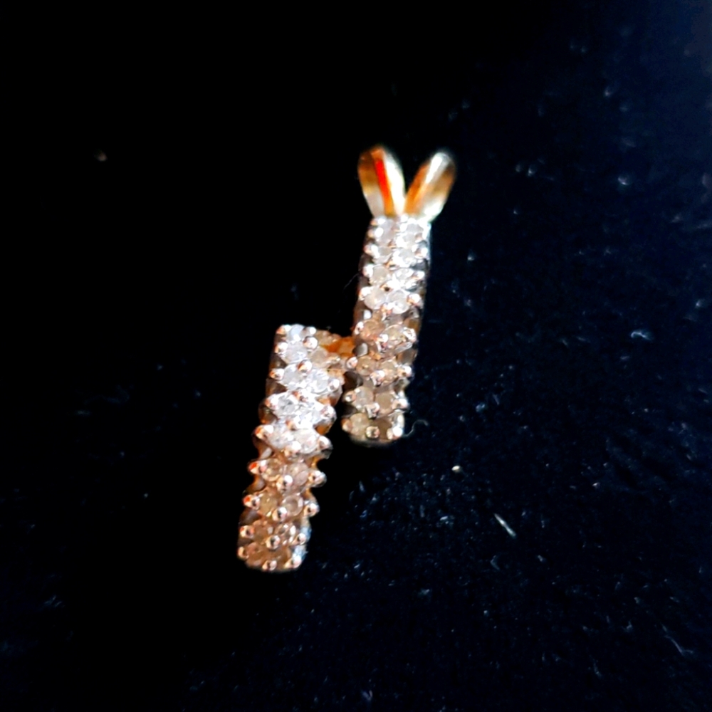Diamond and gold pendant